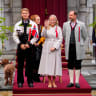 Norway's Crown Princess Mette-Marit waves as she, along with Crown Prince Haakon and Prince Sverre Magnus, greet the children's procession as part of Norway's National Day, Asker, Norway, May 17, 2026.
