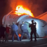 Emergency responders at the scene of a plane crash on a highway near Laredo, Texas, June 17, 2026.