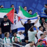Supporters with flags from Palestine, Israel and Iran in the stands during the World Cup match between Iran v New Zealand at the Los Angeles Stadium on June 15, 2026.