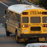 School District bus sits in traffic on Interstate 5 during the afternoon commute on November 7, 2025 in San Diego CA. 