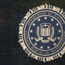  J. Edgar Hoover Federal Bureau of Investigation (FBI) Building WASHINGTON, DC - JUNE 3: A Department of Justice Federal Bureau of Investigation sign is displayed outside of the J. Edgar Hoover Federal Bureau of Investigation building on June 3, 2026 in Washington, DC. 