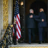 US President Donald Trump (R) and Israeli Prime Minister Benjamin Netanyahu (L) walk inside after Netanyahu arrived at Trump's Mar-a-Lago residence in Palm Beach, Florida; December, 2025.