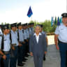 Prime minister Yitzhak Shamir reviews honor guard at police staff graduation ceremony, outside Jerusalem Theater, 1991.
