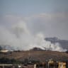 Smoke billows from southern Lebanon following an Israeli strike, as seen from Kfartibnit, Lebanon, June 19, 2026.