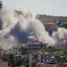Smoke billows from southern Lebanon following an Israeli strike, as seen from Nabatieh, southern Lebanon, June 19, 2026.