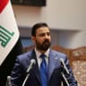 Iraqi Prime Minister-designate Ali al-Zaidi speaks during a parliamentary session to vote in a new government at the parliament headquarters in Baghdad, Iraq, May 14, 2026.