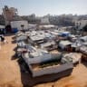 A wide view shows tents and shelters set up in Gaza on June 10, 2026. 