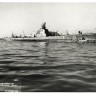 The submarine USS Herring (SS-233) passes Hunters Point Naval Shipyard in San Francisco on October 12, 1943.