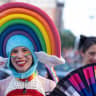 People march in the Capitol Pride Parade on June 20, 2026 in Washington, DC. The Capitol LGBT parade had been postponed due to President Trump's UFC fight at the White House. 