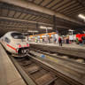 Passengers walk at a platform of the main train station in Munich, Germany, June 23, 2026 after the German rail operator Deutsche Bahn cancelled trains in Germany following a nationwide train radio outage. 