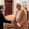 Iranian Foreign Minister Abbas Araqchi shakes hands with Sultan of Oman Haitham bin Tariq Al Said in Muscat, Oman, June 23, 2026.