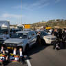 Ultra-Orthodox (haredi) Jewish men block Highway 1 near Ein Hemed as they rally against the imprisonment of yeshiva students who failed to comply with IDF draft orders, on June 24, 2026.
