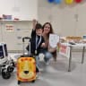 Three-and-a-half-year-old Rafael and his mother beside the Berlin Heart device following one of the surgeries he underwent at Clalit's Schneider Children's Medical Center.