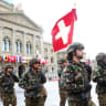 Soldiers from the Swiss army's Infantry Readiness Company 104/1 and the Guard of Honour march past the Swiss Parliament building ahead of the state visit of South African President Cyril Ramaphosa at Federal Square in Bern, Switzerland, October 29, 2025
