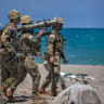 Japanese troops take part in a counter-landing live fire exercise as part of the annual Balikatan joint military drills on May 04, 2026 in Laoag, Ilocos Norte province, Philippines.