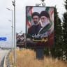 Vehicles drive past billboards showing Iran’s Supreme Leader Ayatollah Mojtaba Khamenei and his late father, with the slogan “Thank you to loyal Iran” erected along the highway leading to Rafic Hariri International Airport in Beirut, Lebanon, June 22, 2026