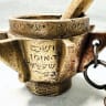 The exceptional treasure, a mortar dating back to around 1805, had oxidized; the shopkeeper found it among his household goods. 