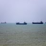 TOPSHOT - In this picture obtained from Iran's ISNA news agency on June 18, 2026, vessels are seen anchored in Bandar Abbas along the Strait of Hormuz. 