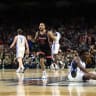 Emanuel Sharp #21 of the Houston Cougars celebrates after the second half in the Final Four game of the NCAA Men's Basketball Tournament against the Duke Blue Devils at the Alamodome on April 05, 2025 in San Antonio, Texas. 