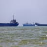  IRAN-US-ISRAEL-WAR-TRANSPORT-HORMUZ In this picture obtained from Iran's ISNA news agency on June 18, 2026, vessels are seen anchored in Bandar Abbas along the Strait of Hormuz. 