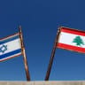 Representations of the Israeli and Lebanese flags at a memorial near the Israel-Lebanon border, outside Metula, Israel, after Israel and Lebanon signed a framework agreement following US-mediated talks, June 27, 2026. 