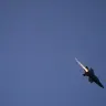 Un F-35 enciende su postquemador mientras sobrevuela el National Mall durante un acto de inauguración de la Great American State Fair, el 24 de junio de 2026 en Washington, D.C.