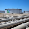 General view of Aramco tanks and oil pipe at Saudi Aramco's Ras Tanura oil refinery and oil terminal in Saudi Arabia May 21, 2018; illustrative.