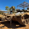 An Israeli soldier works on a tank on the Israeli side of the Israel-Lebanon border, after Israel and Lebanon signed a framework agreement following US-mediated talks, in northern Israel, June 28, 2026. 