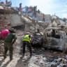 Rescuers and volunteers search for survivors on the rubble of a collapsed building in La Guaira state, Venezuela, on June 28, 2026.