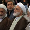 IRAN'S JUDICIARY Chief Gholam-Hossein Mohseni Ejei (C) attends a gathering at the Imam Khomeini Mosque (Mosalla) to commemorate those killed in former wars and also those killed during the latest US-Israel led war, in Tehran on May 24, 2026. 
