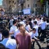 Protesters supporting the conscription of ultra-Orthodox Jewish men into the Israeli military block a road in the ultra-Orthodox city of Bnei Brak, central Israel, in protest against the continued road blockades by ultra-Orthodox demonstrators following the arrest of draft evaders, June 26, 2026.