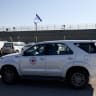 A view shows a Red Cross vehicle outside the Israeli military prison Ofer ahead of the expected release of Palestinian prisoners, as part of a ceasefire and a hostages-prisoners swap deal between Hamas and Israel, near Ramallah, in the West Bank, January 30, 2025. 