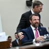 US Rep. Michael Guest (R-MS) touches the shoulder of US Secretary of Homeland Security Markwayne Mullin as he testifies at a House Appropriations Homeland Security Subcommittee hearing on Capitol Hill in Washington, DC, US, June 25, 2026. 