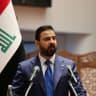Iraqi Prime Minister-designate Ali al-Zaidi speaks during a parliamentary session to vote in a new government headed by Ali al-Zaidi as prime minister, at the parliament headquarters in Baghdad, Iraq, May 14, 2026. 