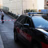 A police vehicle stands near a cordon near the site of an explosion on Monday, in Monaco, June 30, 2026.
