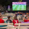 Israeli kids watch a World Cup match between Portugal and Uzbekistan at an outdoor screening in Jaffa, June 23, 2026.