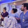 Dr. Norma Espinoza and Dr. Homero Salcido watch the World Cup during the birth of their first child.