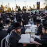 Ultra-Orthodox Jewish men from the Vizhnitz Hasidic dynasty study Torah outside the Justice Ministry in Jerusalem during a silent protest against the imprisonment of yeshiva students who failed to comply with military recruitment orders, July 1, 2026; Illustrative.