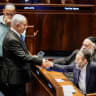 Prime Minister Benjamin Netanyahu arrives at Knesset plenum to vote in favor of Basic: Law Torah Study bill, shaking hands with Degel Hatorah leader MK Moshe Gafni, Wednesday, July 1, 2026.