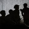 his photograph shows shadows of volunteers rescuers appearing during an operation by US rescuers to find survivors in Catia la Mar in La Guaira state, Venezuela, on June 30, 2026.
