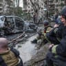 Firefighters take a break as they work at a site of a Russian missile and drone strikes, amid Russia’s attack on Ukraine, in Kyiv, Ukraine, July 2, 2026.