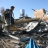 An Iranian Kurdish Peshmerga member of the Kurdistan Democratic Party of Iran (KDPI) inspects damage sustained at the Azadi Camp of the Kurdistan Democratic Party of Iran on March 3, 2026; Illustrative.