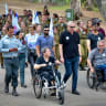 Israeli Minister of Defense Benny Gantz, Israeli soldiers and Israeli veterans and disabled IDF soldiers seen during a march honoring IDF wounded and disabled IDF, in Tel Aviv, November 17, 2021.