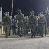 Homeland Security Investigations (HSI) and Immigration and Customs Enforcement (ICE) arrive to push protesters back as cars enter and leave the Delaney Hall Immigration Detention Center on June 12, 2026 in Newark, New Jersey. 