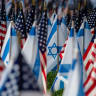 US and Israeli flags fill the field at Statler Park in Boston, Massachusetts, on October 18, 2023
