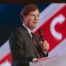 Conservative political commentator and podcast host Tucker Carlson speaks at Turning Point's annual AmericaFest conference, in remembrance of late right-wing political activist Charlie Kirk, in Phoenix, Arizona on December 18, 2025.