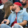 Singer Taylor Swift and Travis Kelce of the Kansas City Chiefs kiss during Game Three between the New York Knicks and the Cleveland Cavaliers in the NBA Eastern Conference Finals at Rocket Arena on May 23, 2026.