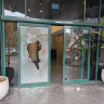 Front door of Channel 12 News offices shattered by vandals in Tel Aviv, July 5, 2026.
