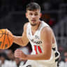 Kerr Kriisa #11 of the Cincinnati Bearcats brings the ball up court during the game against the Alabama State Hornets at Fifth Third Arena on December 17, 2025 in Cincinnati, Ohio.