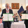 Australia’s Prime Minister Anthony Albanese and Fiji’s Prime Minister Sitiveni Rabuka pose for a picture after signing a treaty and an alliance, as Fiji’s President Ratu Naiqama Lalabalavu looks on at State House in Suva, Fiji, July 6, 2026.